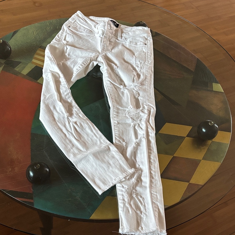bebe White Ripped Skinny Jeans